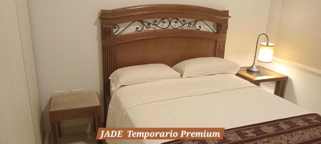 Ένα ή περισσότερα κρεβάτια σε δωμάτιο στο JADE temporario premiun