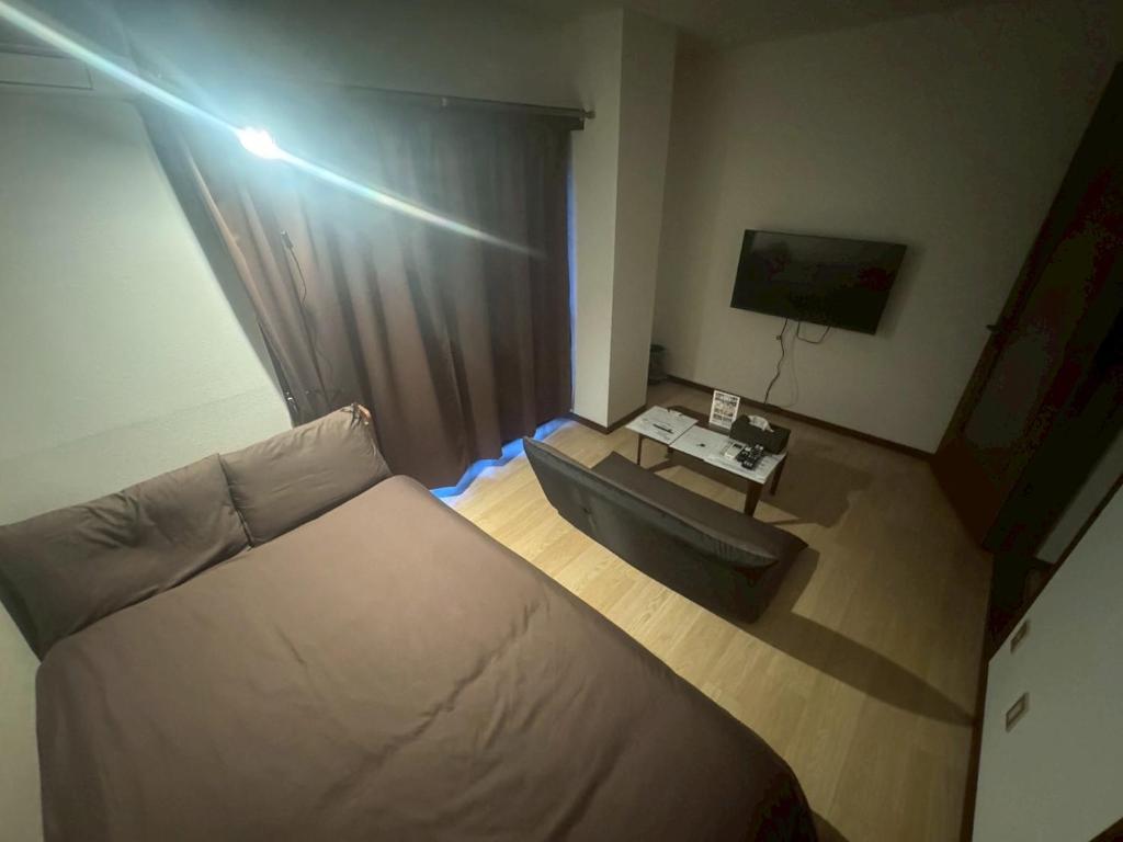 TV a/nebo společenská místnost v ubytování Apartment Hotel Kuki