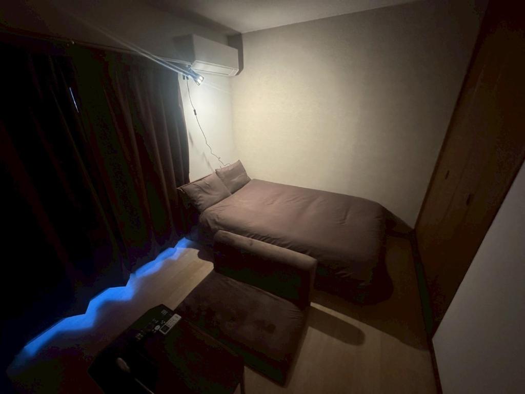 Postel nebo postele na pokoji v ubytování Apartment Hotel Kuki