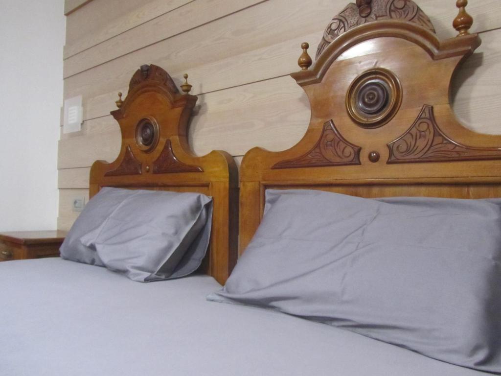 Postel nebo postele na pokoji v ubytování NonSoloMele