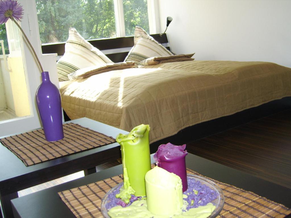 Ένα ή περισσότερα κρεβάτια σε δωμάτιο στο Nikol Apartments