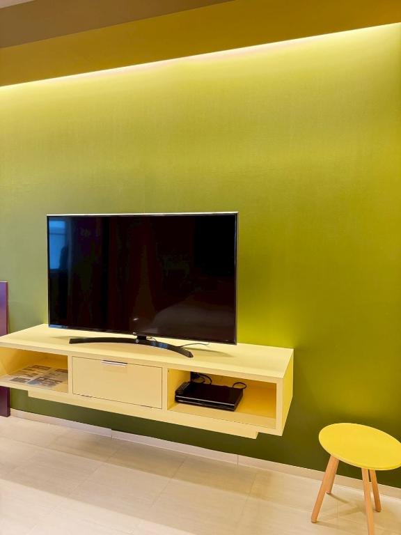 Hotel JOYCEにあるテレビまたはエンターテインメントセンター