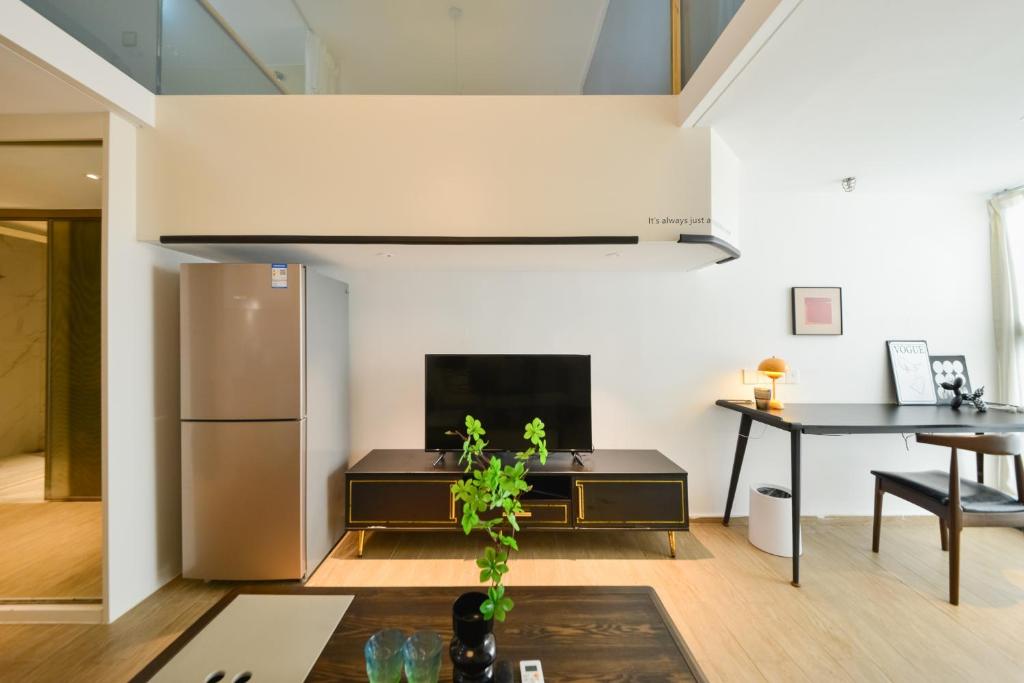 Kuchyň nebo kuchyňský kout v ubytování Dabaizhijia Executive Apartment Bantian Huawei Branch