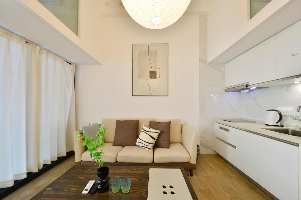 Kuchyň nebo kuchyňský kout v ubytování Dabaizhijia Executive Apartment Bantian Huawei Branch