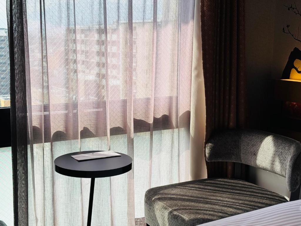 Postel nebo postele na pokoji v ubytování Shizutetsu Hotel Prezio Kyoto Karasumaoike