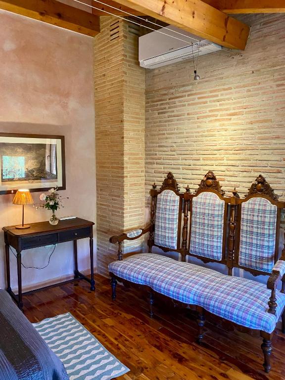 Postel nebo postele na pokoji v ubytování La Casa de Los Moyas