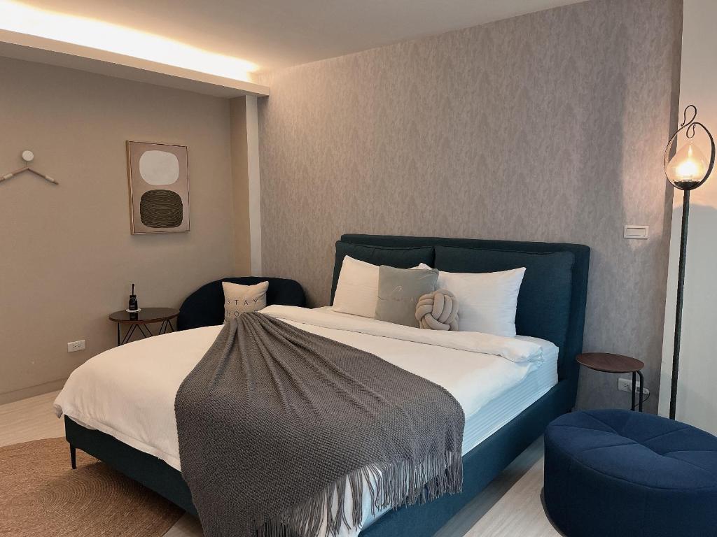 Postel nebo postele na pokoji v ubytování Minilove Homestay