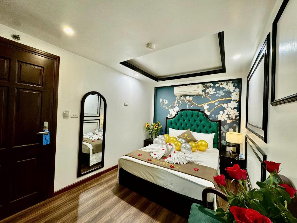 Postel nebo postele na pokoji v ubytování Bảo Anh Hotel