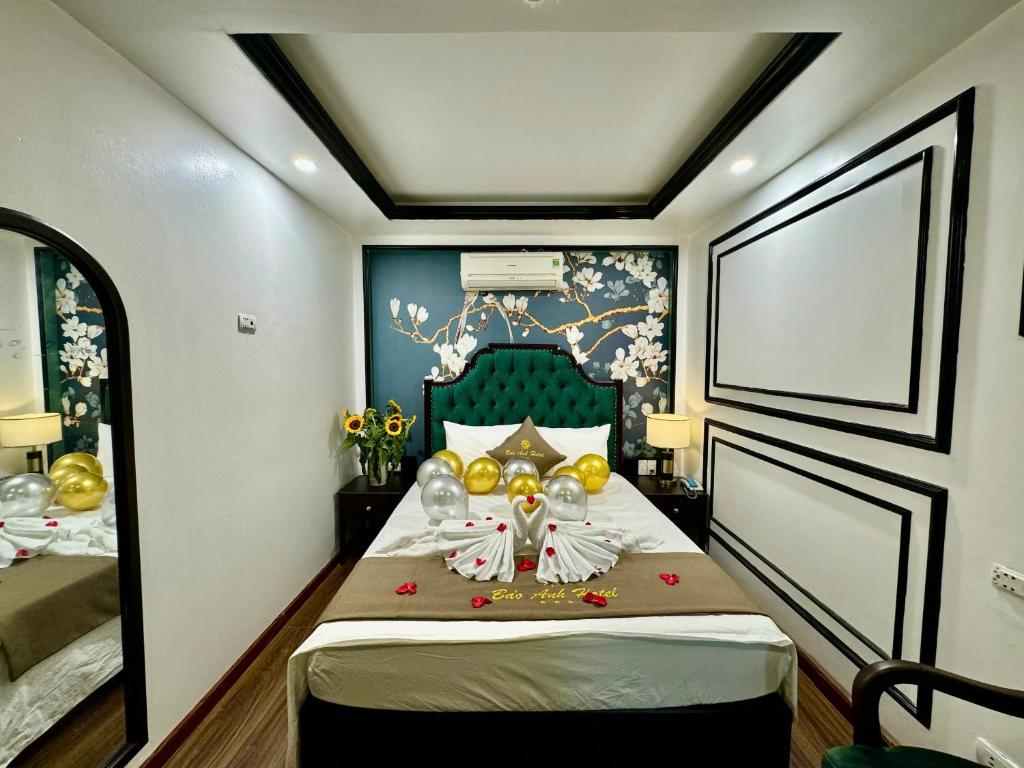 Postel nebo postele na pokoji v ubytování Bảo Anh Hotel