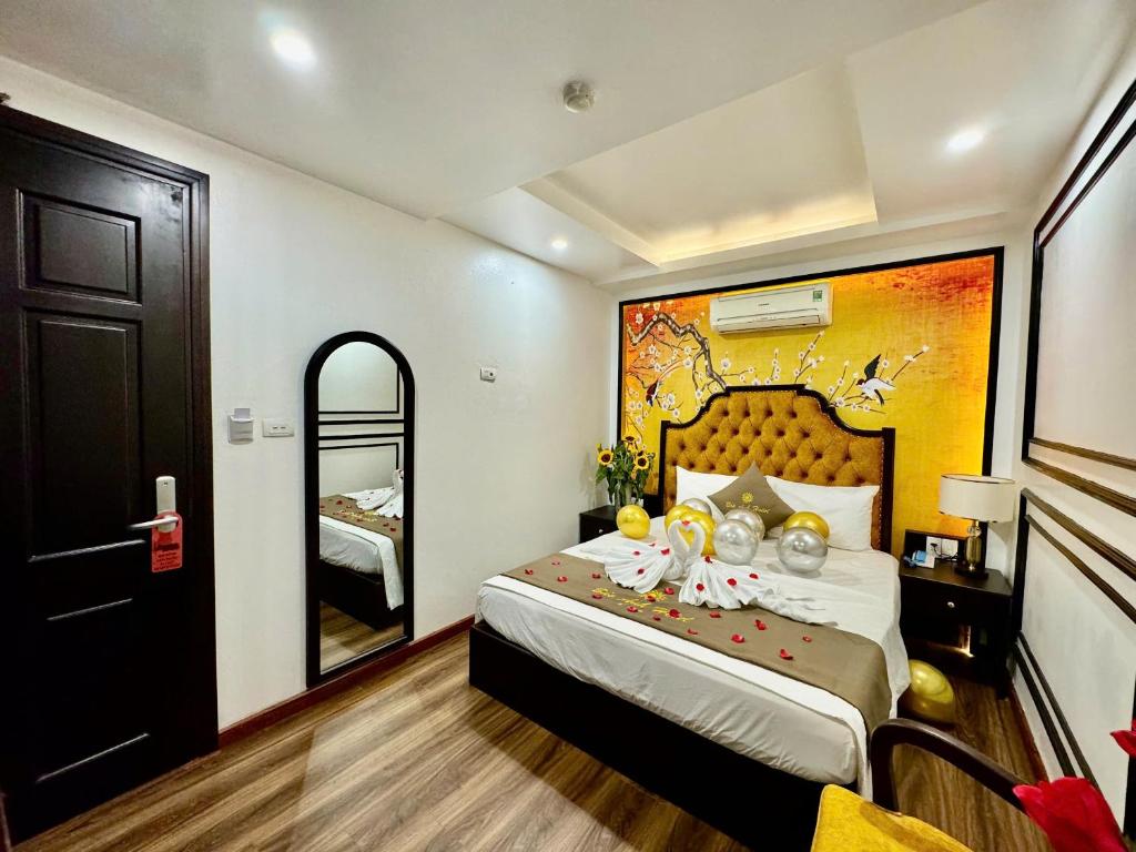 Postel nebo postele na pokoji v ubytování Bảo Anh Hotel