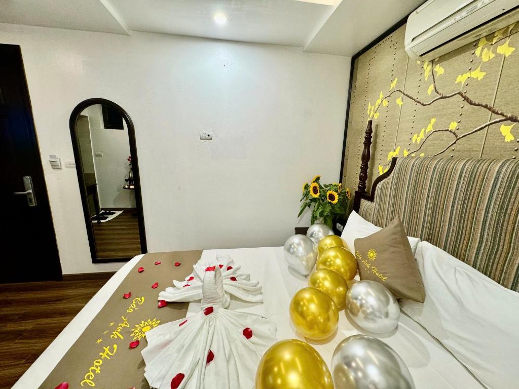 Postel nebo postele na pokoji v ubytování Bảo Anh Hotel