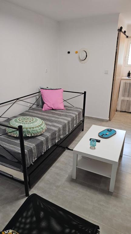 Postel nebo postele na pokoji v ubytování Oikies Verde III-F