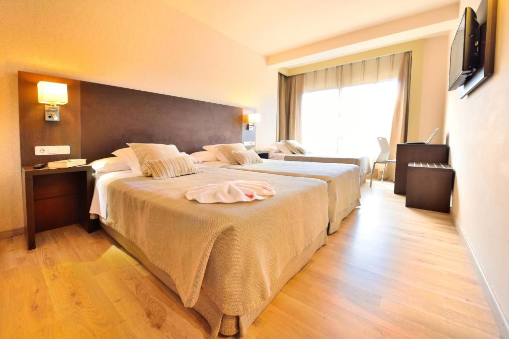 Cama o camas de una habitación en Hotel Spa Norat O Grove 3* Superior