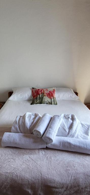 Ένα ή περισσότερα κρεβάτια σε δωμάτιο στο Casa Vitorino