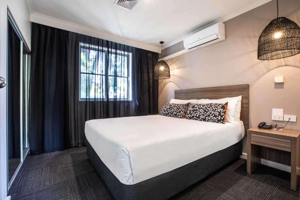 Postel nebo postele na pokoji v ubytování Doncaster Apartments by Nightcap Plus