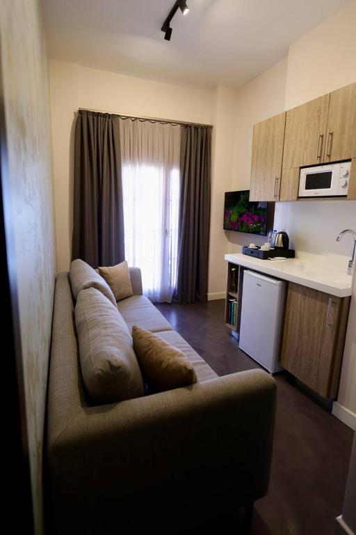 Kuchyň nebo kuchyňský kout v ubytování Comfy apart hotel