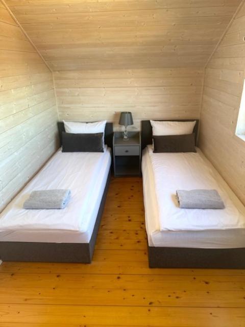 Posteľ alebo postele v izbe v ubytovaní Silver Park Resort 10m do plaży
