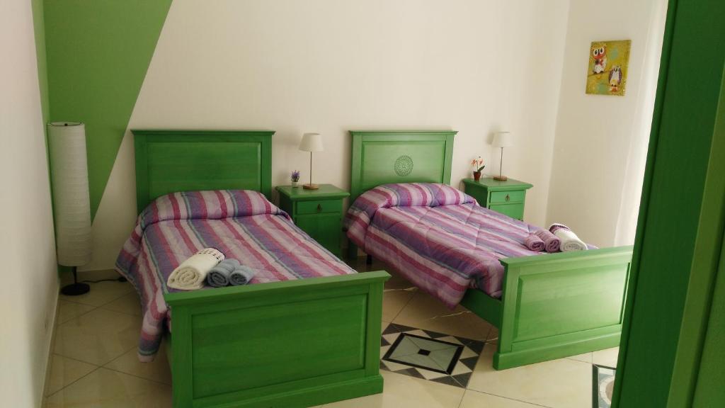 Postel nebo postele na pokoji v ubytování B&b Sa Zodia Guest House