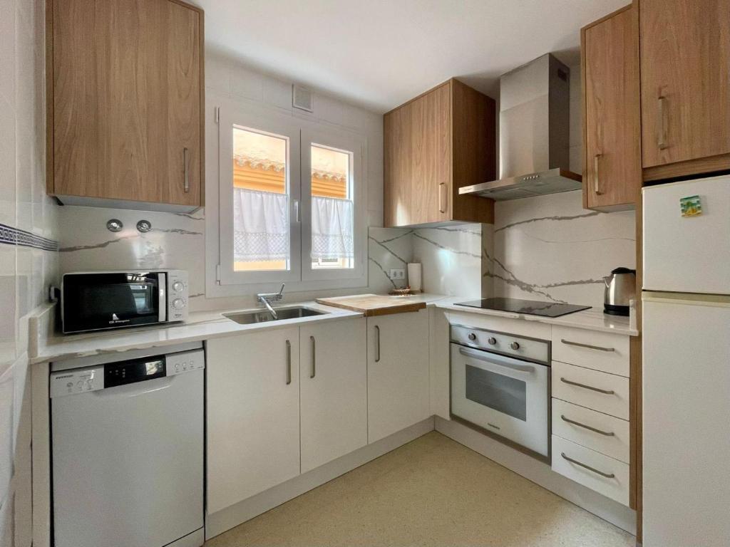 Kuchyňa alebo kuchynka v ubytovaní Duplex Surla Pájaro vistas al mar