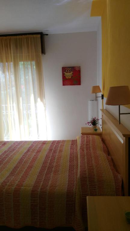 Postel nebo postele na pokoji v ubytování B&b Sa Zodia Guest House