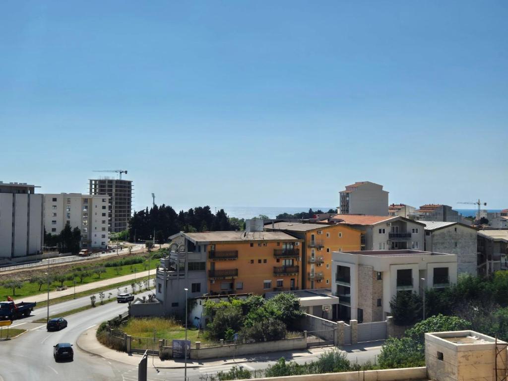 a view of a city with buildings and a highway at Apartments 402 in Bar
