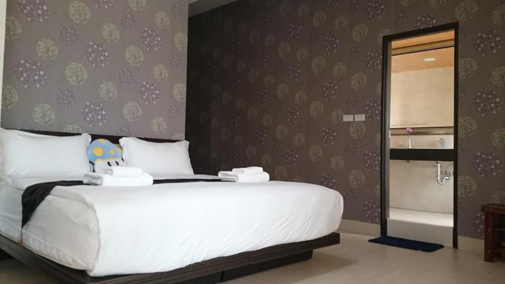 Postel nebo postele na pokoji v ubytování Amalfi Homestay