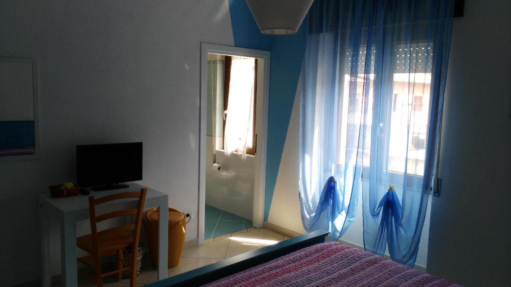 TV a/nebo společenská místnost v ubytování B&b Sa Zodia Guest House