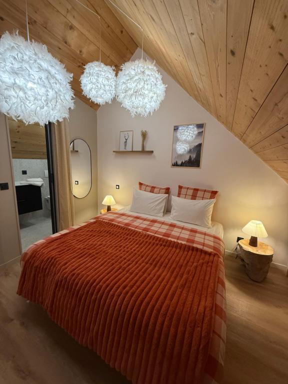 Postel nebo postele na pokoji v ubytování Loges de chanaz