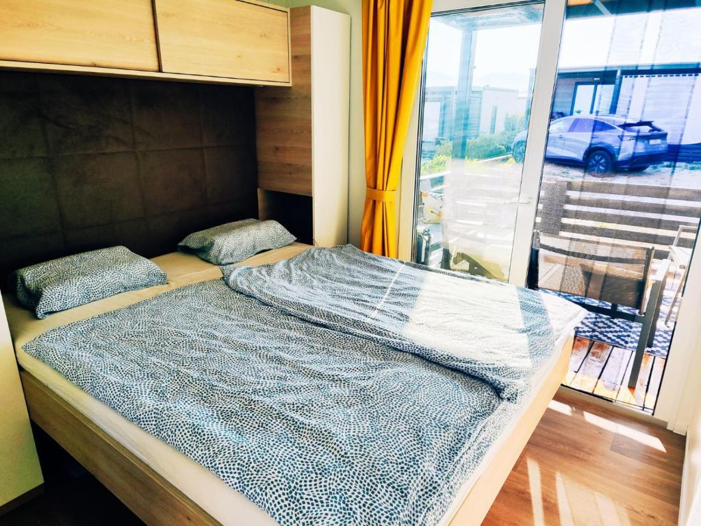 Voodi või voodid majutusasutuse Izzi Mobile Home - Terra Park SpiritoS toas