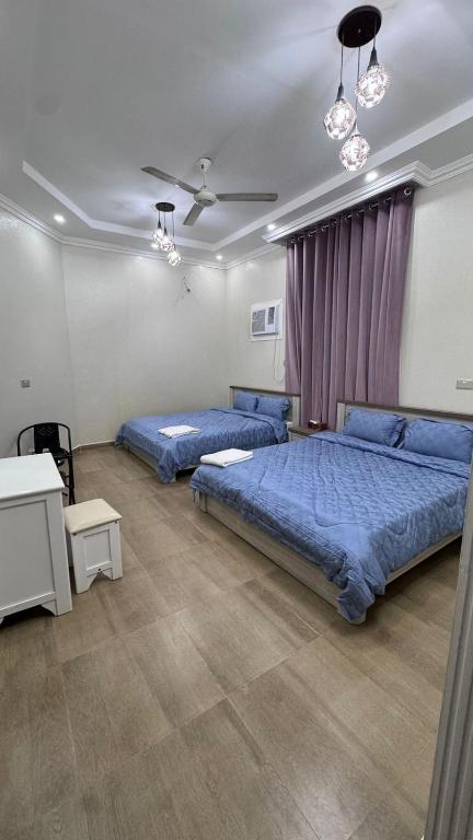 Postelja oz. postelje v sobi nastanitve Afaq guest house