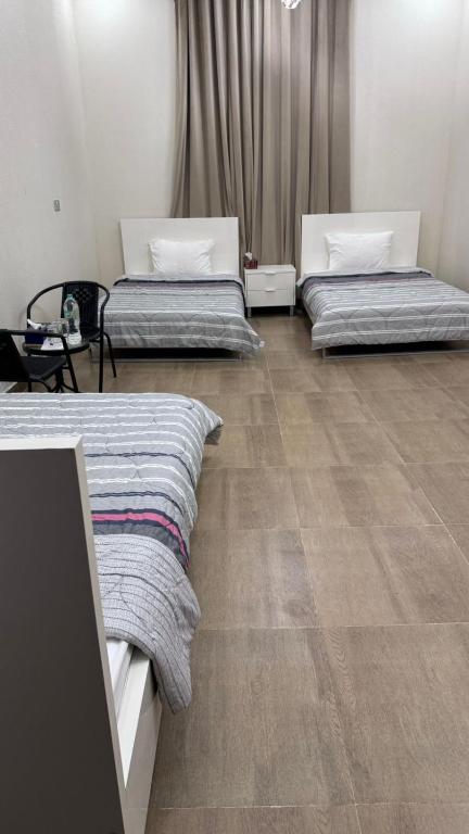 Postelja oz. postelje v sobi nastanitve Afaq guest house