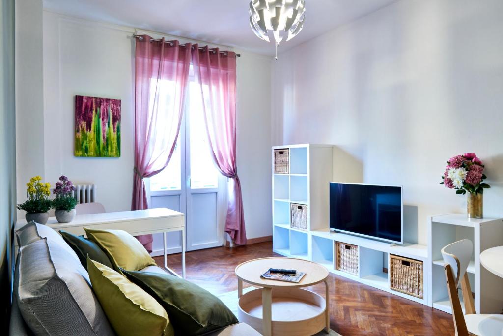 TV a/nebo společenská místnost v ubytování VEGA RIBBON