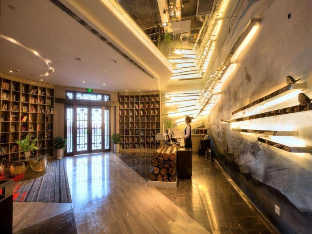 Posezení v ubytování Qingdao Tired Bird Hotel