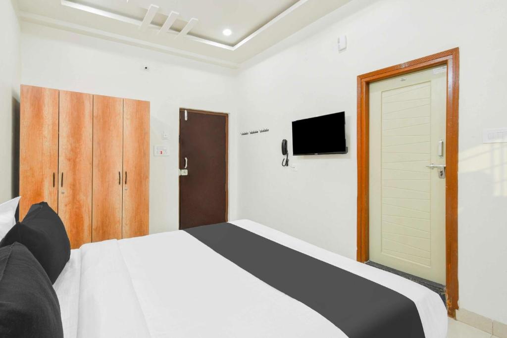 TV a/nebo společenská místnost v ubytování Super Townhouse Kokapet Near GAR