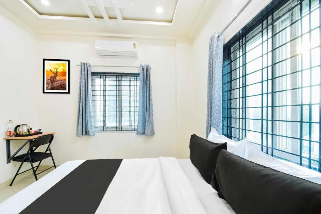 Postel nebo postele na pokoji v ubytování Super Townhouse Kokapet Near GAR