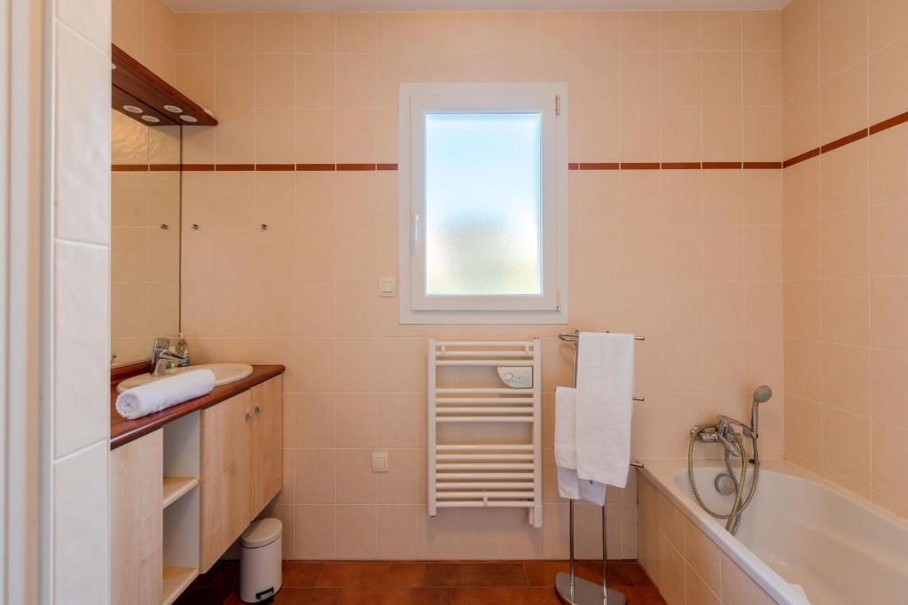 Kúpeľňa v ubytovaní Maison proche de la plage