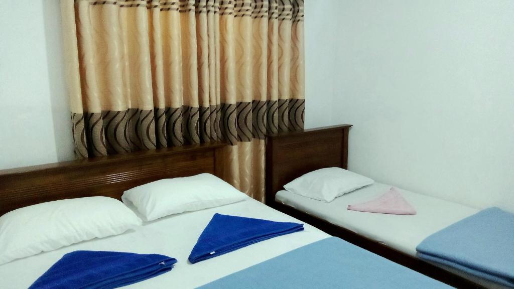 Postel nebo postele na pokoji v ubytování Ella Mount Villa