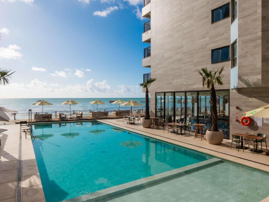 Bazén v ubytování Ibis Styles Maragogi - O primeiro Ibis Styles pé na areia do Brasil nebo v jeho okolí