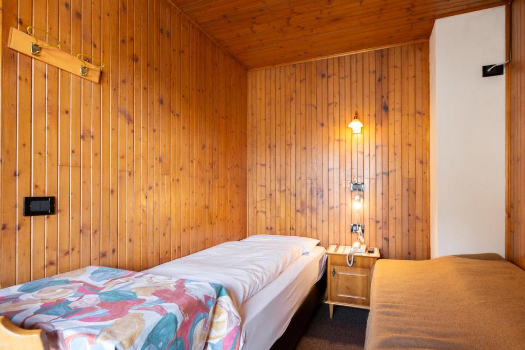 Postel nebo postele na pokoji v ubytování Hotel Oswald