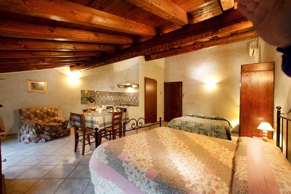 Postel nebo postele na pokoji v ubytování B&B Casale Onida