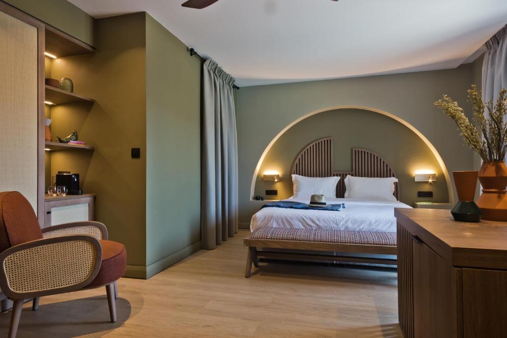 Postel nebo postele na pokoji v ubytování Arcus Luxury Suites Karpathos
