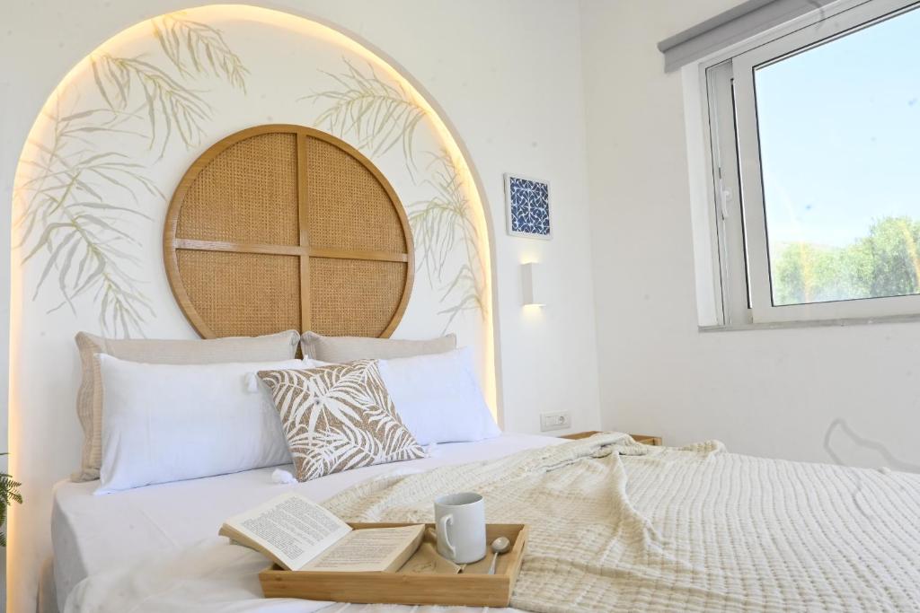 Łóżko lub łóżka w pokoju w obiekcie Marika Studios & Apartments