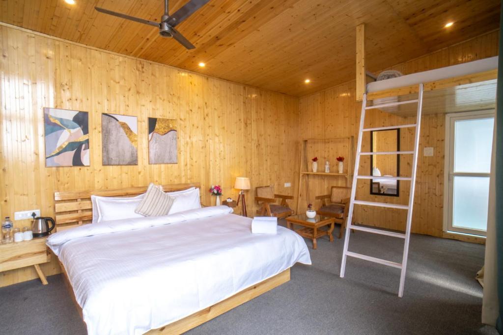Postel nebo postele na pokoji v ubytování Ila by Aaryam, Kanatal