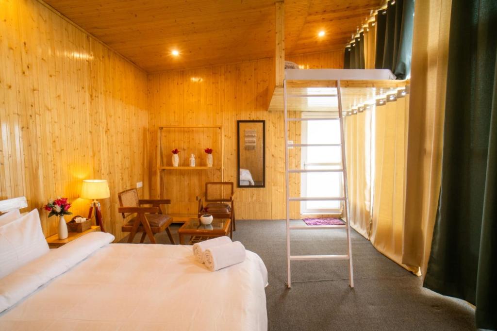 Postel nebo postele na pokoji v ubytování Ila by Aaryam, Kanatal