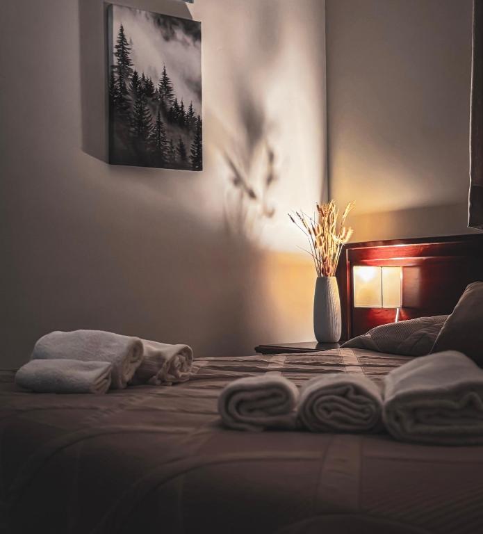 Postel nebo postele na pokoji v ubytování Freya Rooms
