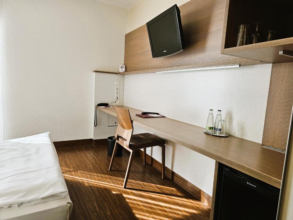 TV a/nebo společenská místnost v ubytování Arvena Park Hotel