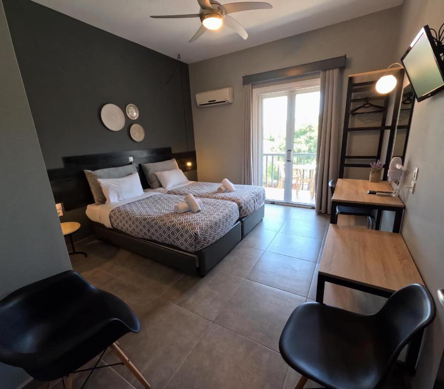 Posteľ alebo postele v izbe v ubytovaní Filoxenia Luxury Studios & Apartments