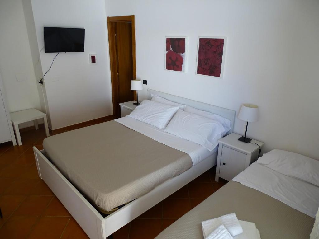 Posteľ alebo postele v izbe v ubytovaní B&B Villa Matari