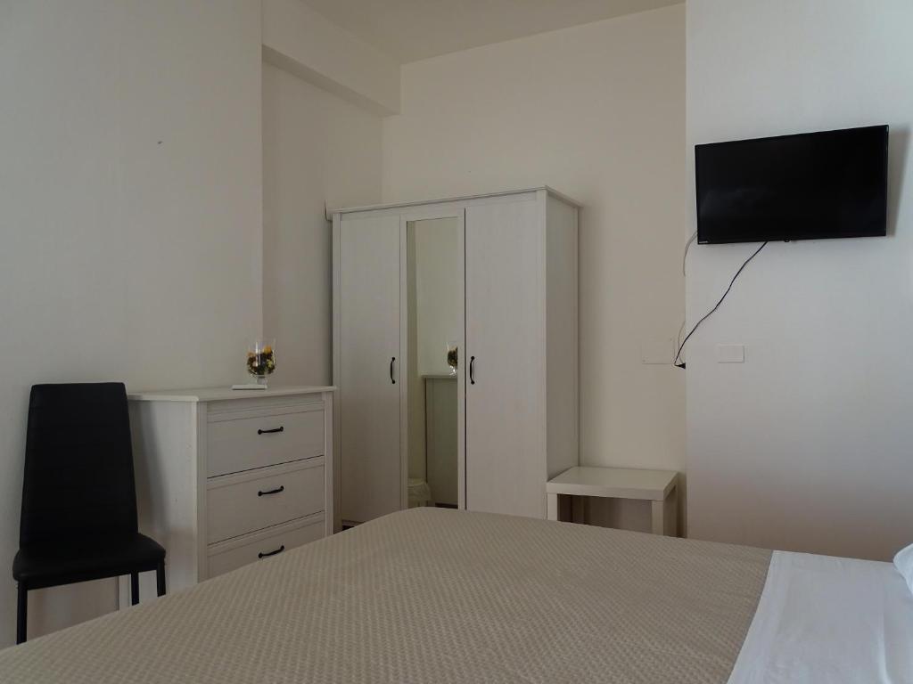 Televízia a/alebo spoločenská miestnosť v ubytovaní B&B Villa Matari