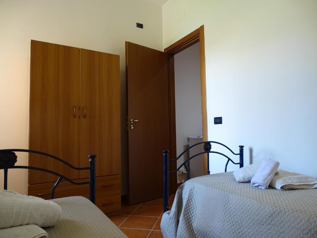 Posteľ alebo postele v izbe v ubytovaní B&B Villa Matari